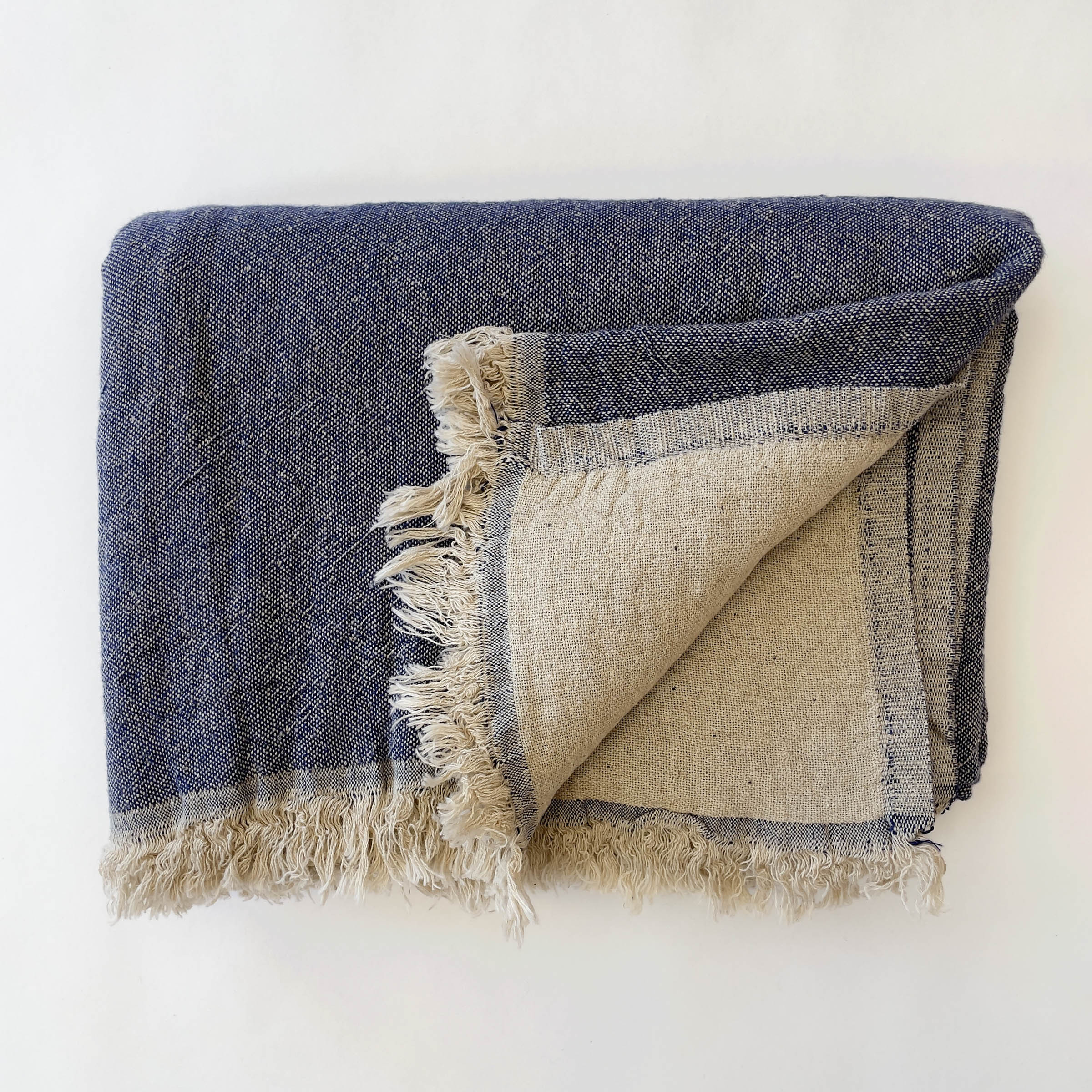 Ekani Throw Blankets