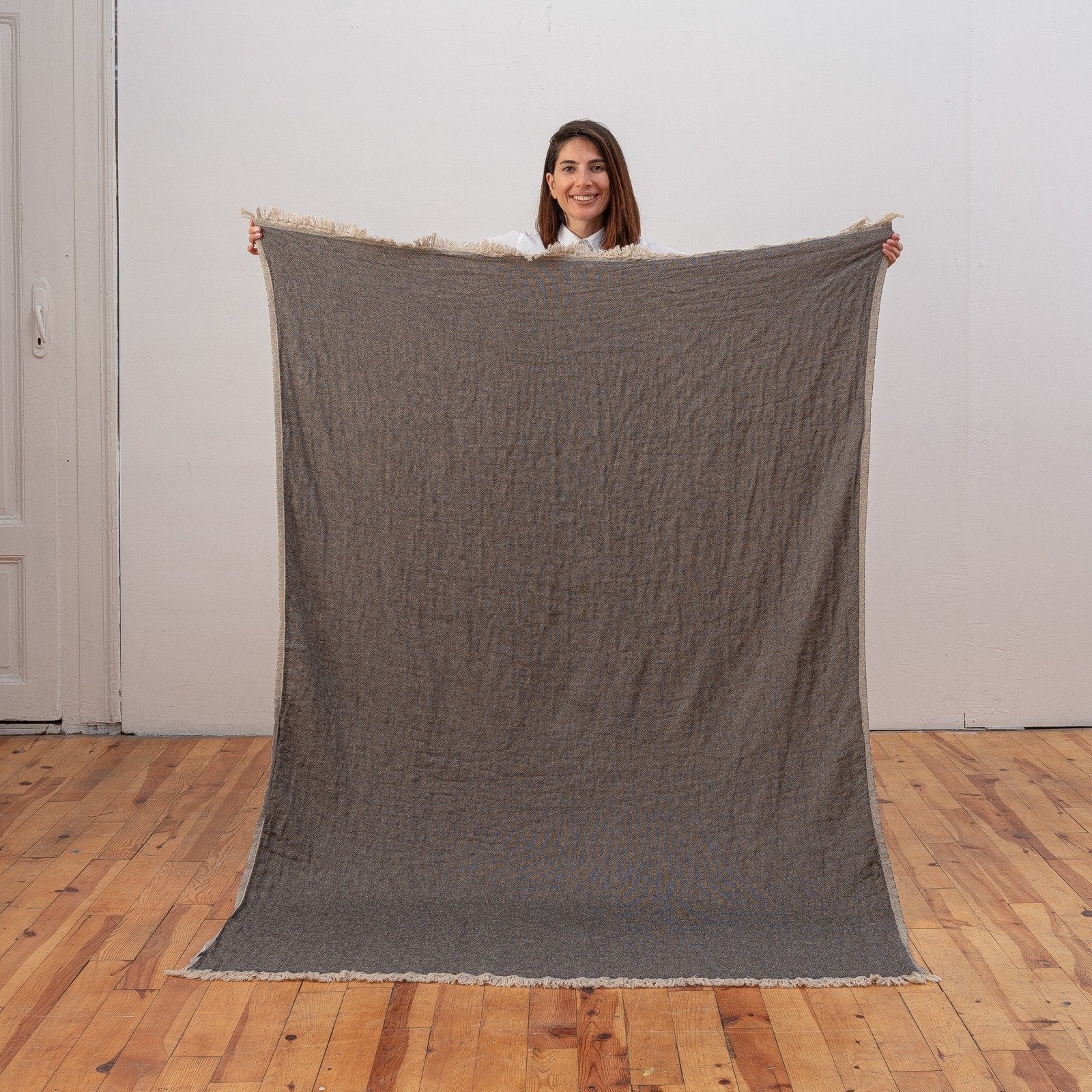 Ekani Throw Blankets