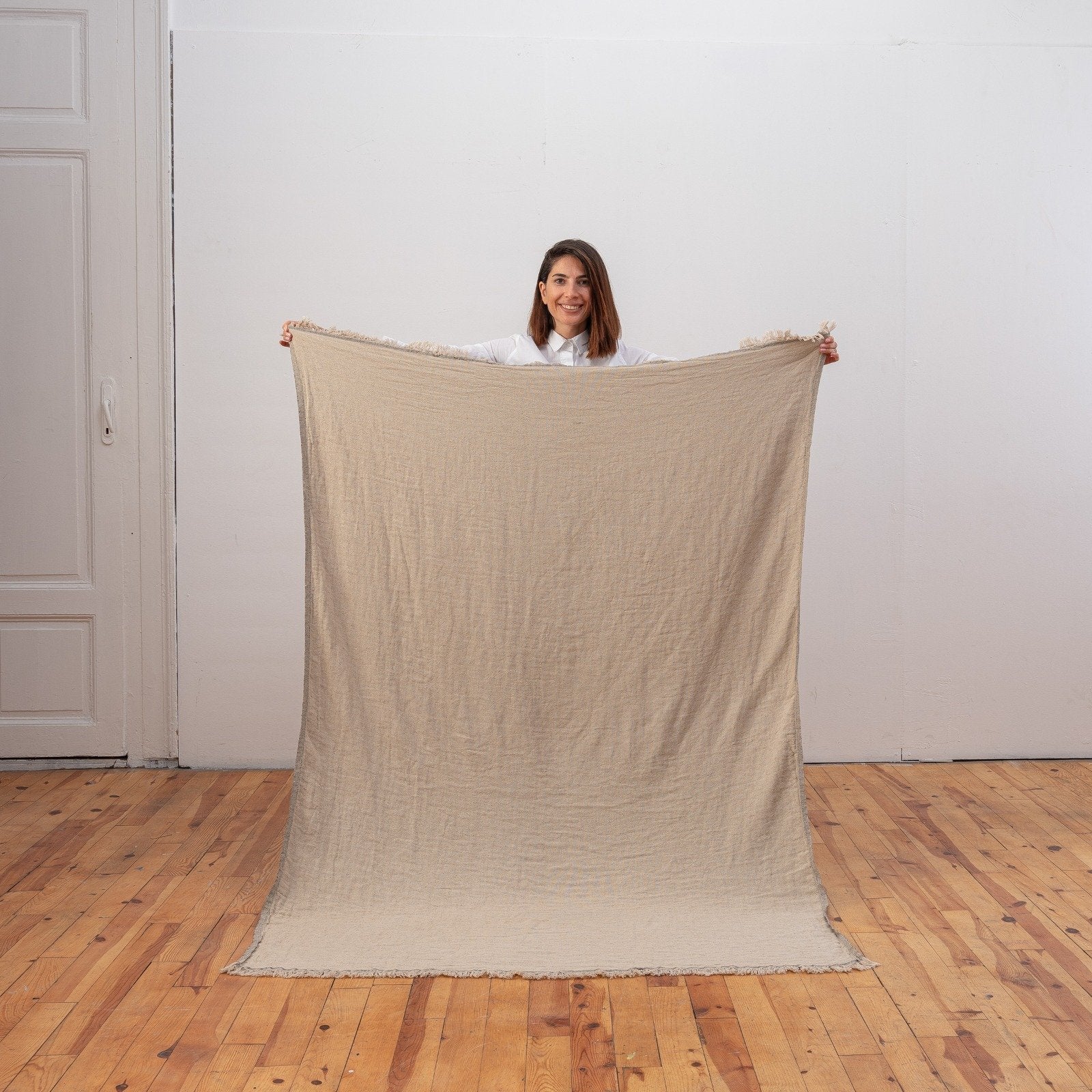 Ekani Throw Blankets
