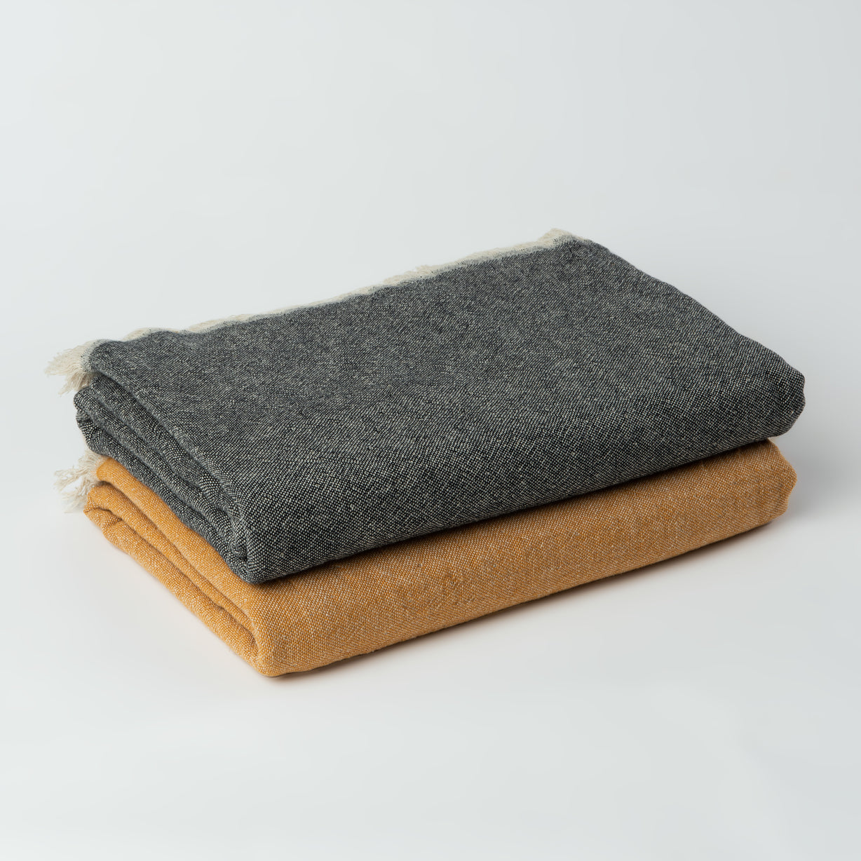 Ekani Throw Blankets