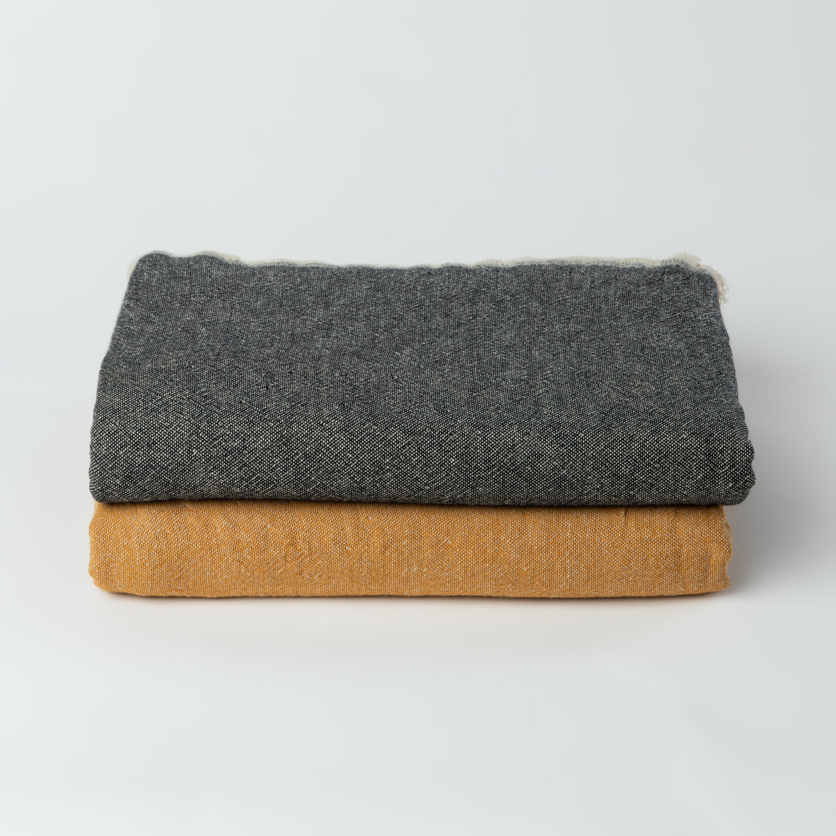 Ekani Throw Blankets