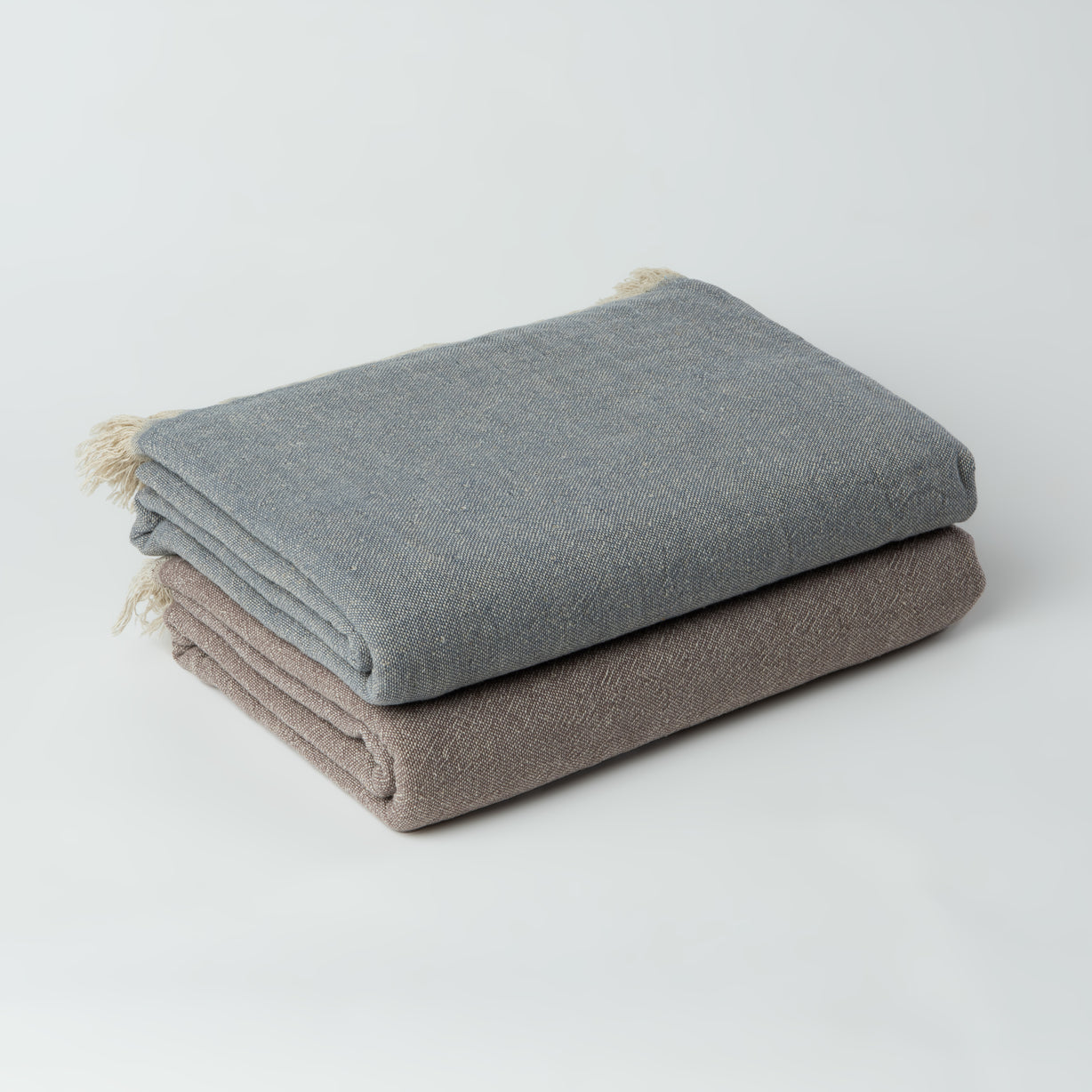 Ekani Throw Blankets